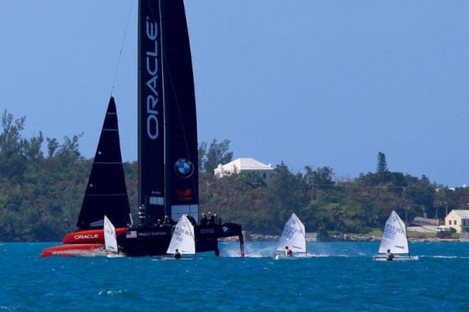 Action-packed on Bermuda's Great Sound: Oracle Team USA out training as the Optimist Worlds compete in their World Championships ©  Tom Clarke